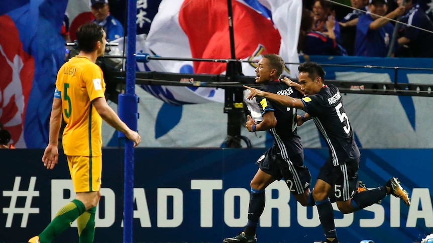 Japan's Ideguchi Yosuke celebrates goal against Socceroos