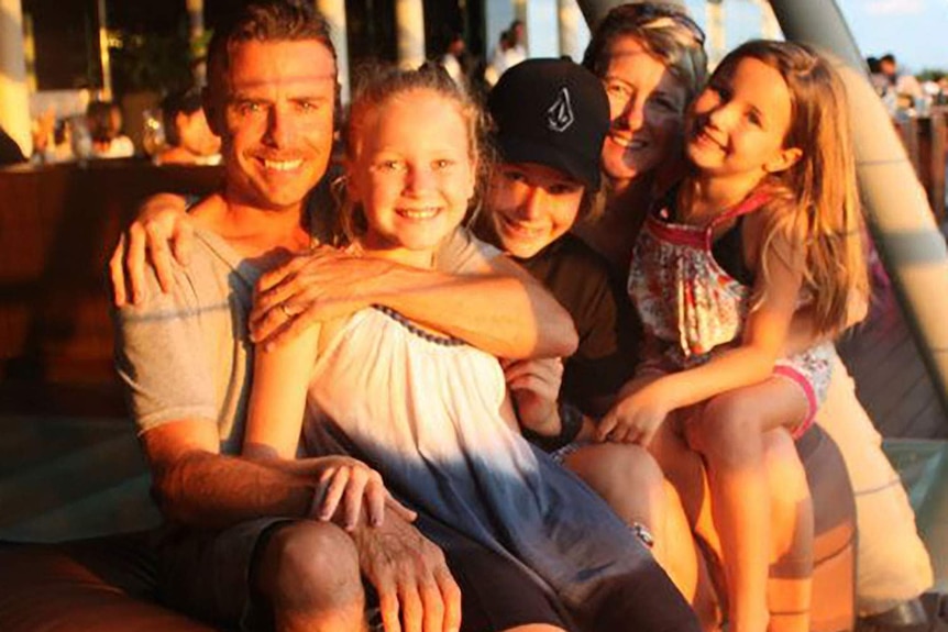 Peter Maynard with his wife Kylie and their three children.