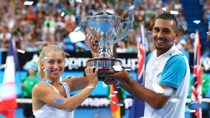 Winners are grinners ... Daria Gavrilova (L) and Nick Kyrgios pose with the Hopman Cup