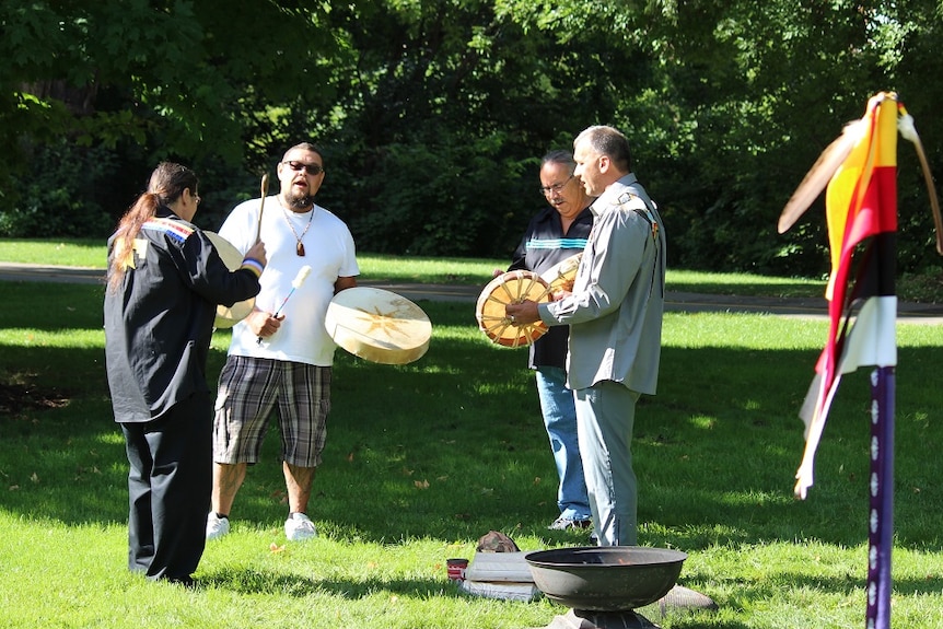 Canadian Aboriginal leaders sing traditional songs at a memorial service for missing and murdered Indigenous women.