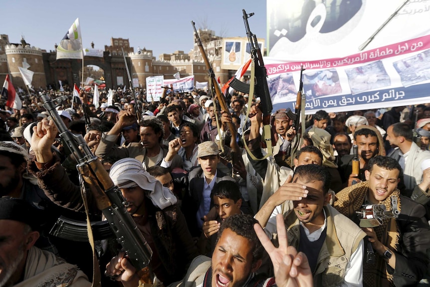 Followers of the Houthi demonstrate against the Saudi-led air strikes on Yemen