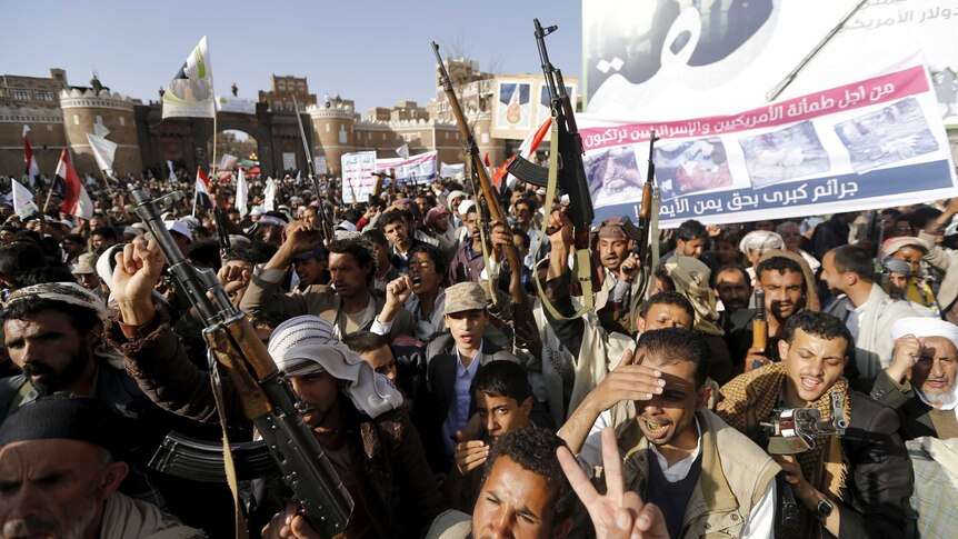 Houthi followers demonstrate against air strikes