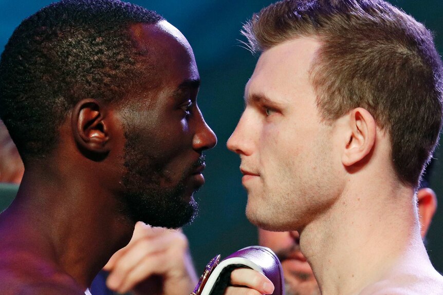 Terence Crawford and Jeff Horn look each other in the eyes