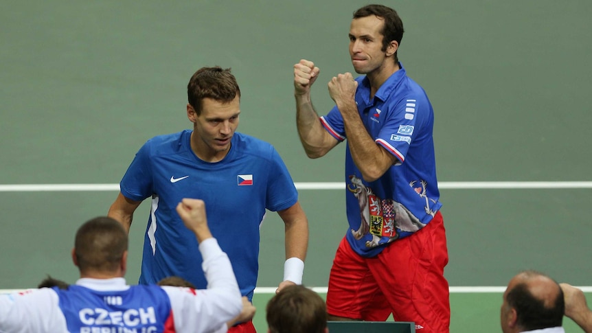 Tomas Berdych and Radek Stepanek celebrate after winning the doubles rubber.