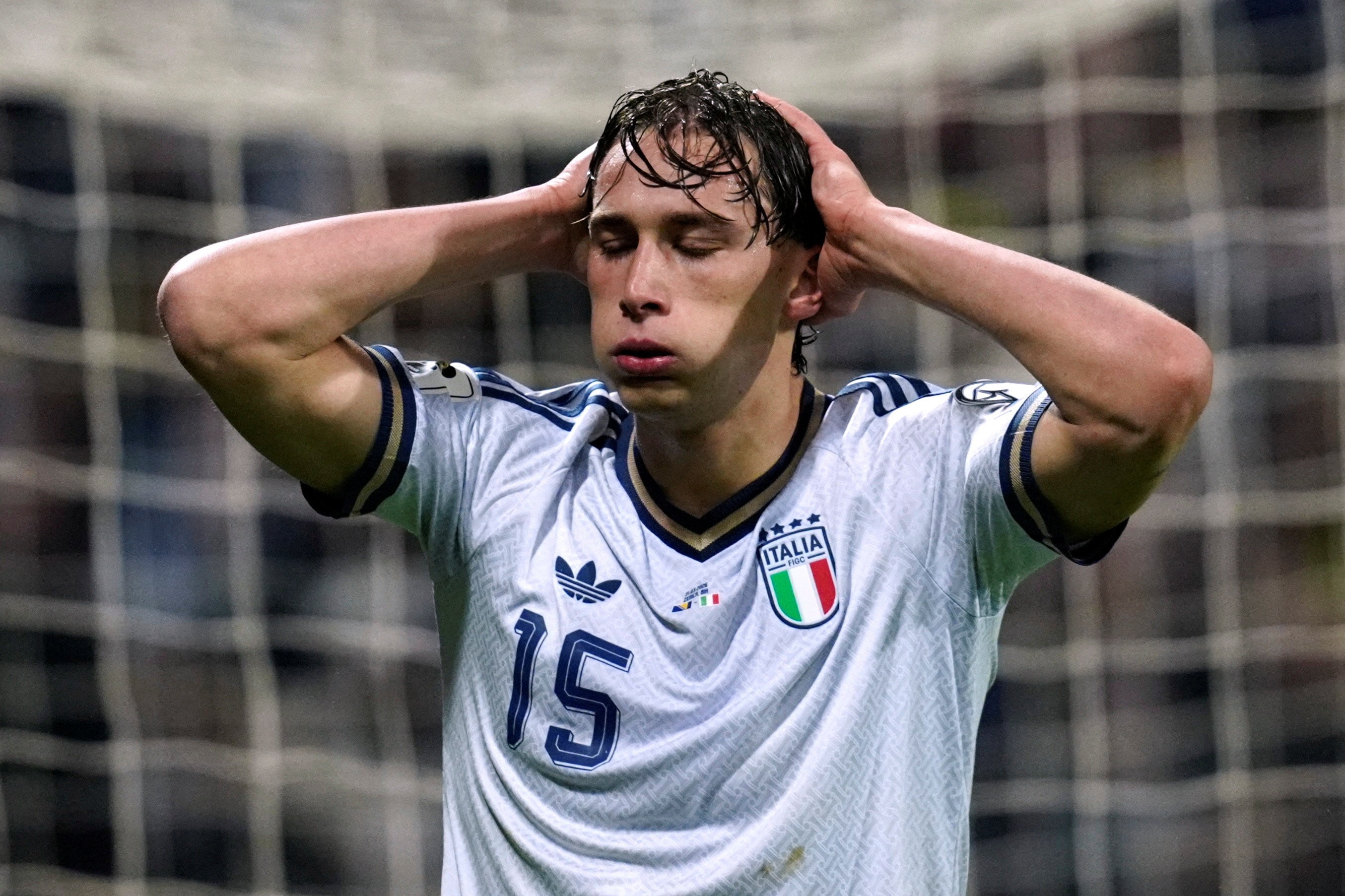 Pio Esposito reacts after missing a penalty against Bosnia and Herzegovina.