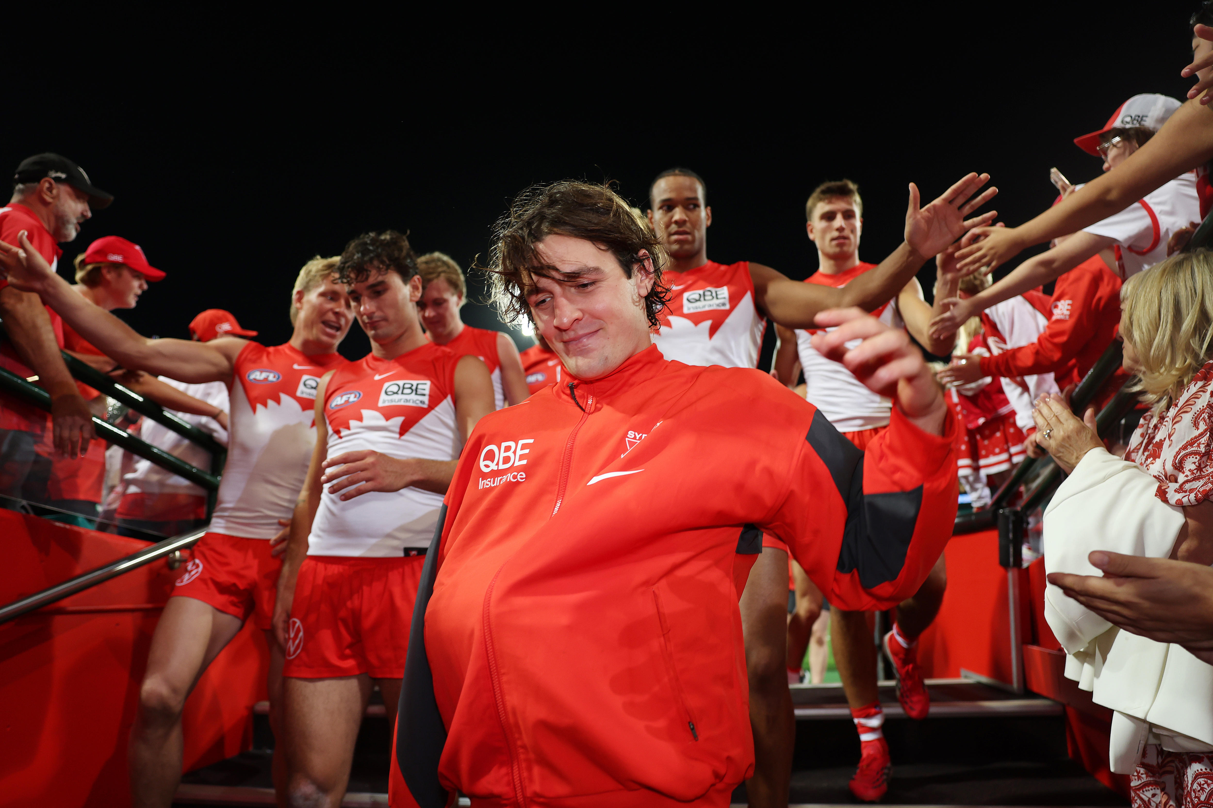 Injuries mar Swans' thumping win over premiers