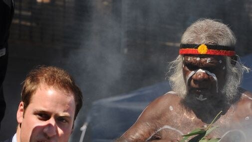 Welcome to country: Prince William watches on during a traditional smoking ceremony in Redfern