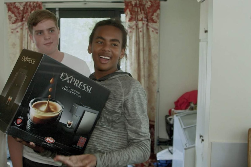 Teenage Boss Michael with coffee machine