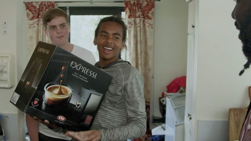 Teenage Boss Michael with coffee machine