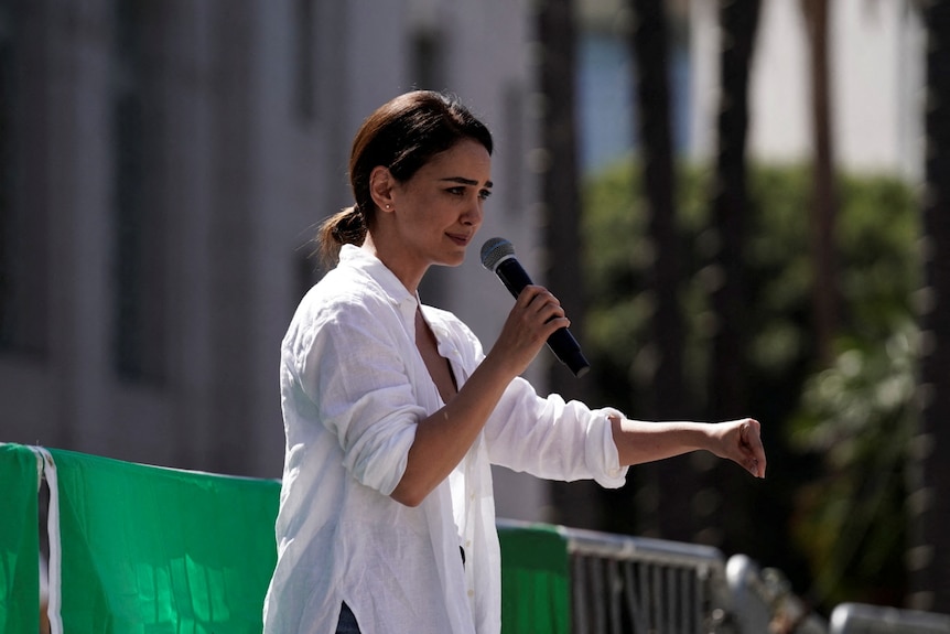 Protesting in support of Iranian women and against the death of Mahsa (Zhina) Amini, outside LA's City Hall