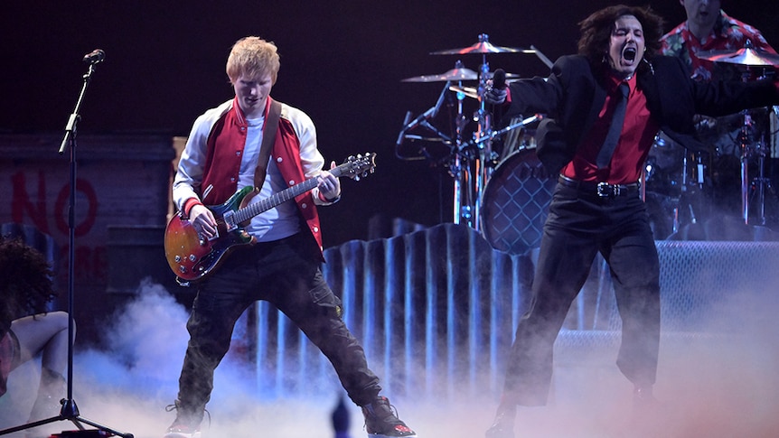 Ed Sheeran and Oli Sykes of Bring Me The Horizon performing at the BRIT Awards 2022