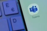 Teams app next to keyboard 