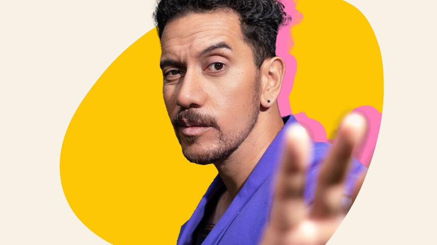A composite image of comedian James Nokise with a yellow background. He looks to the camera and holds two fingers up. 