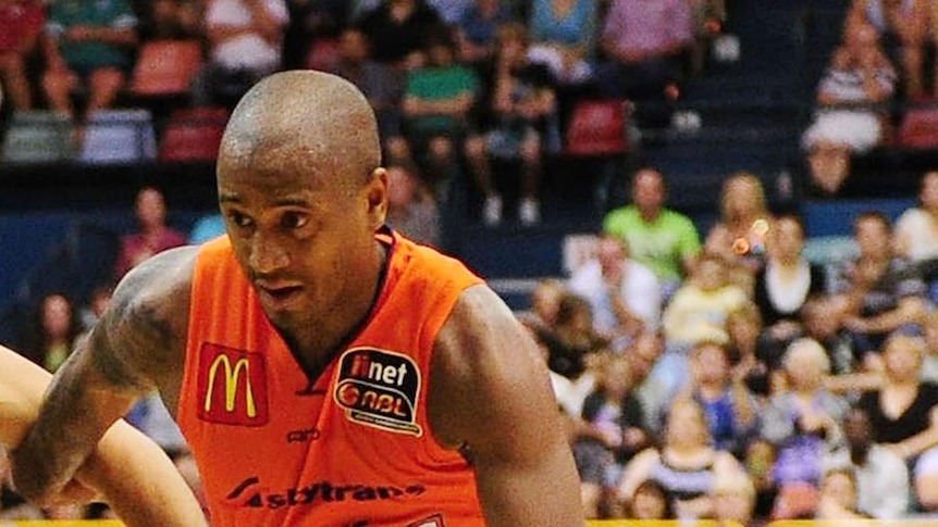 Leading from the front ... Ayinde Ubaka had 18 points for the Taipans.