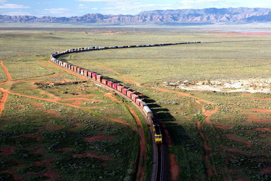 Freight train snaking through remote country