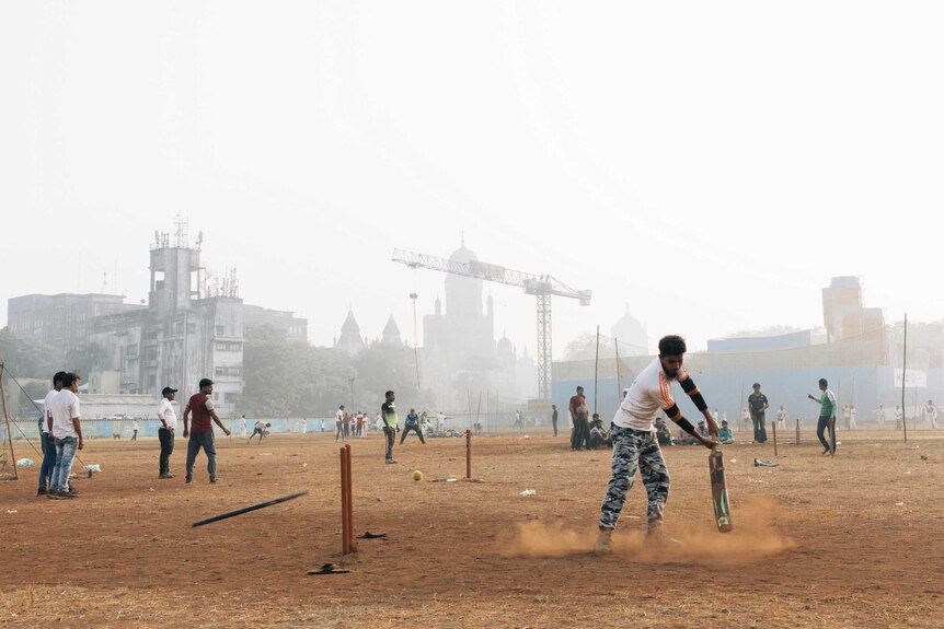 People play cricket in Azad Maidan in Mumbai.