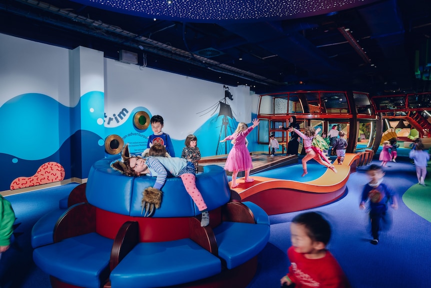 Children play on a play area. 