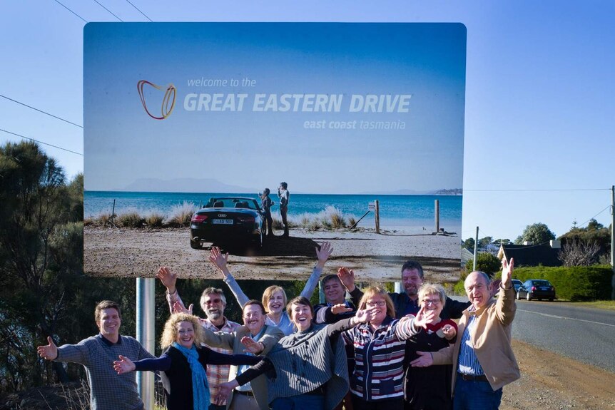 Local tourism operators in front of new billboard