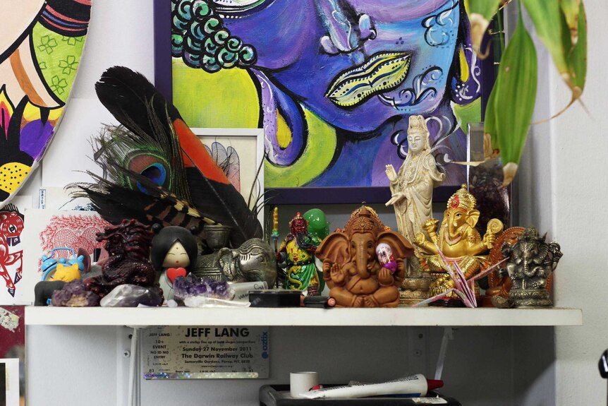 A colourful shelf of figurines.