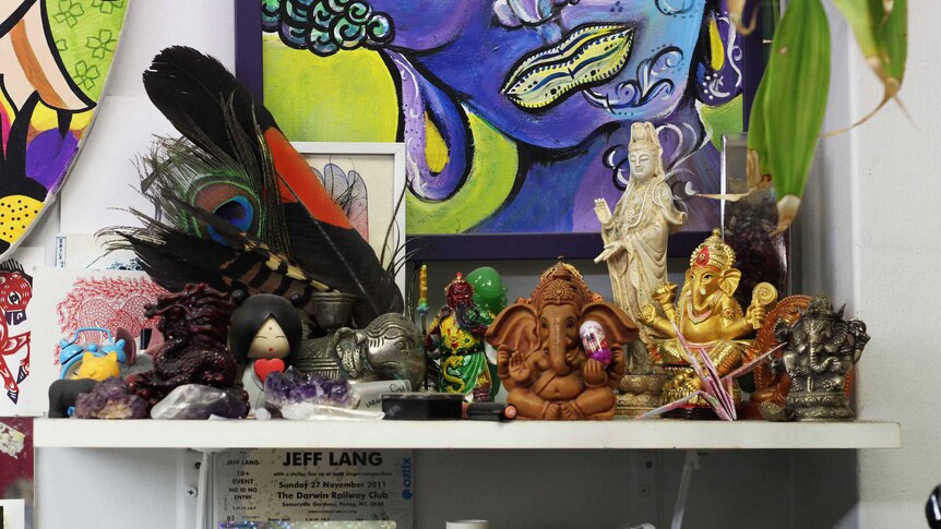 A colourful shelf of figurines.