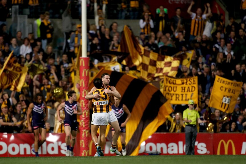 Hawthorn's Cyril Rioli (33) celebrates a goal against Fremantle at Subiaco in the preliminary final.