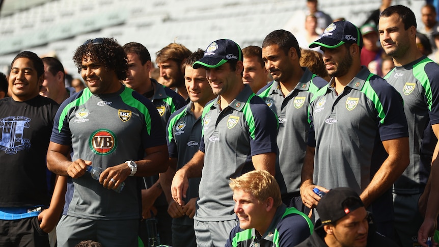 Ready for battle ... The Kangaroos pose for a photo during the fan day at Eden Park