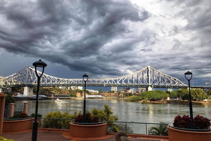 Storm clouds over Brisbane's Story Bridge from the city.