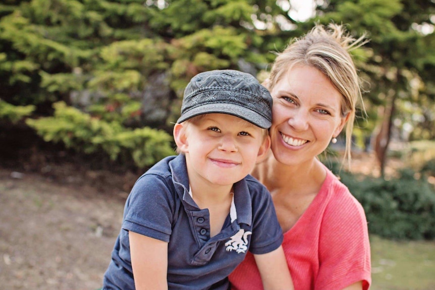Portrait of demographer Lisa Denny with her son Rory, who has disabilities