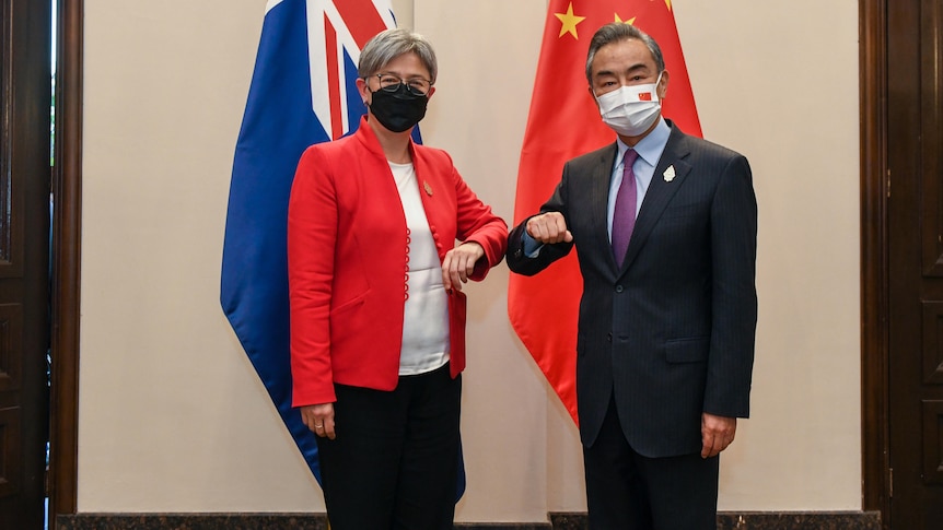 China’s foreign minister blames Morrison’s government for poor relations and tells Penny Wong to ‘treat us as a partner, not a threat’