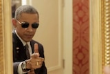 US president Barack Obama poses in front of a mirror in a new Buzzfeed video advertising healthcare