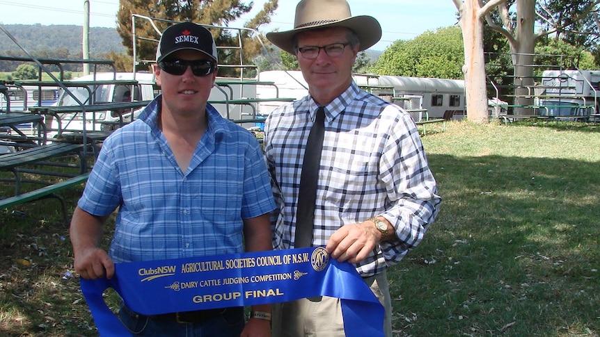 Tom Otten from Bemboka receives first prize from Canadian judge Brent Walker