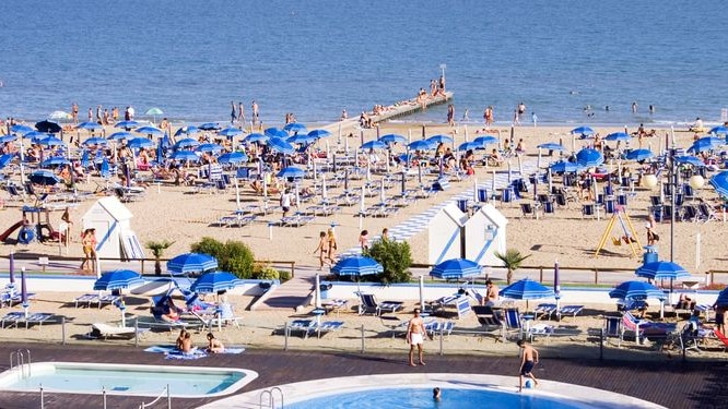 Patrons use the beach at Jesolo, Italy