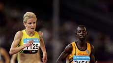 Melissa Rollison and Ugandan Dorcus Inzikuru in the 3000m steeplechase.