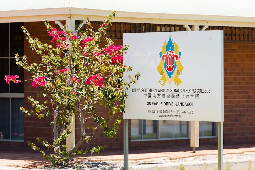 A sign displaying the words 'China Southern West Australian Flying College'.