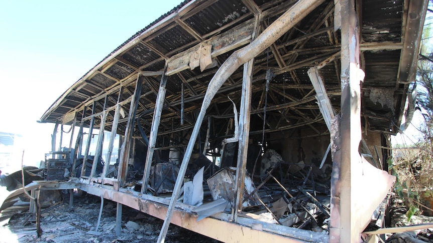 The burnt-out remains of an administration building after a riot on Nauru