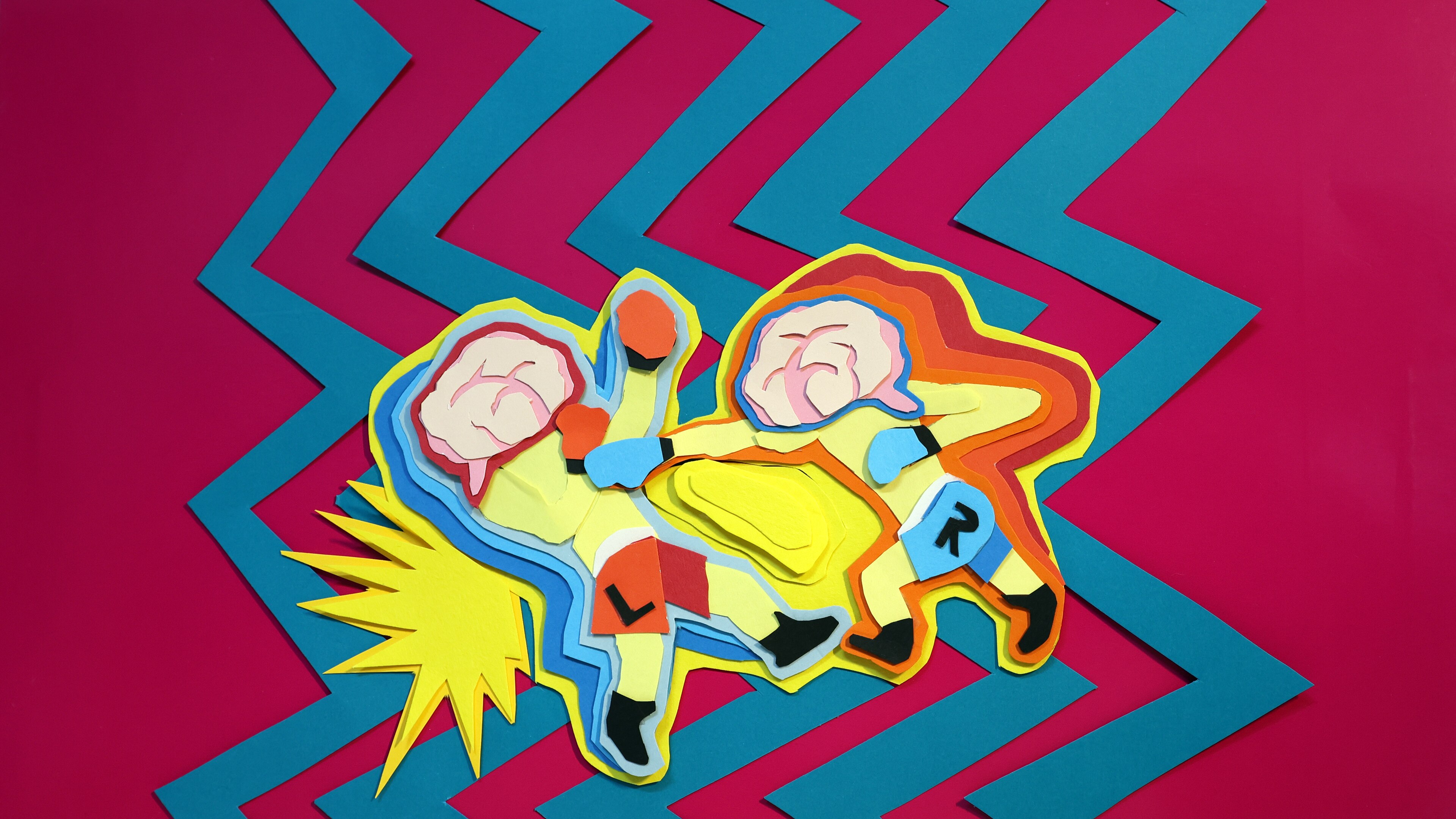 An artwork showing two boxers with brains for heads fighting. One has an R to show the right side and one has an L to show left.