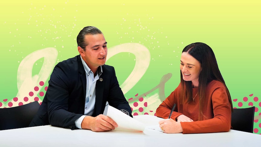 Man showing career counsellor his resume while she takes notes in a story about reaching out to contacts for job opportunities.