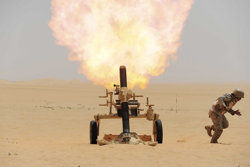 Saudi soldier fires mortar