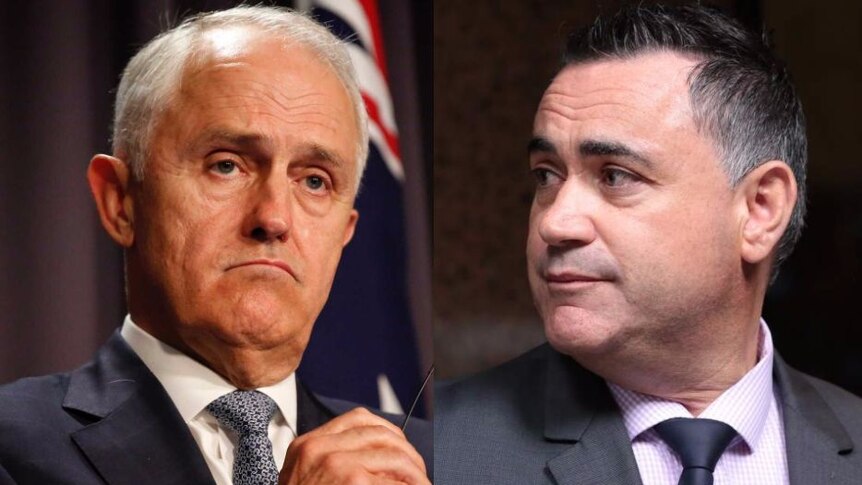 Malcolm Turnbull looks displeased as John Barilaro looks over at him