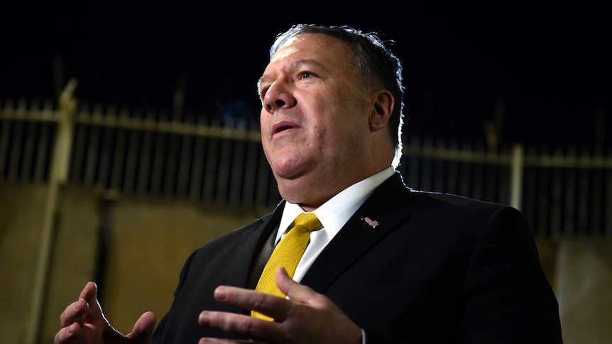 US Secretary of State Mike Pompeo speaks while gesturing his hands.