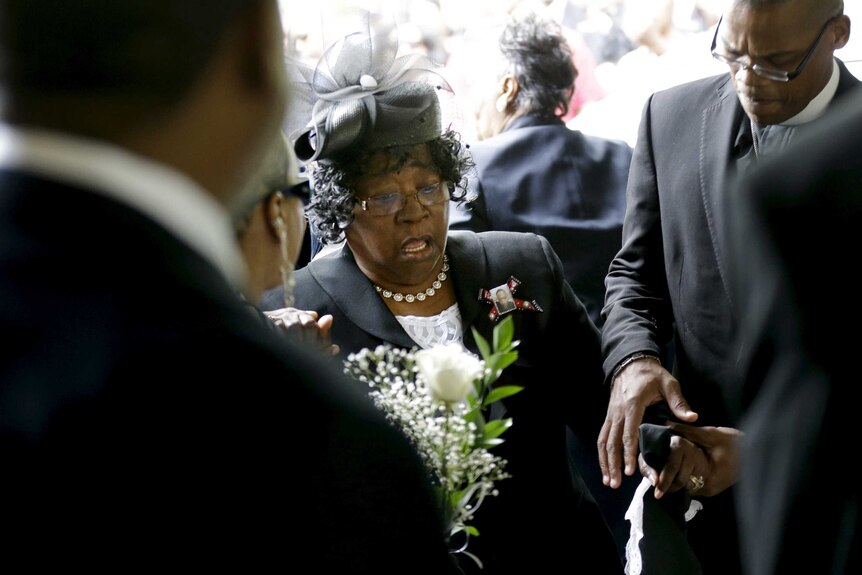 Walter Scott's mother Judy arrives at his funeral