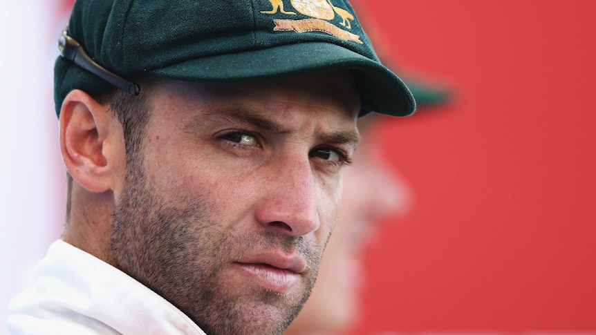 Phillip Hughes looking into the lense of a camera.