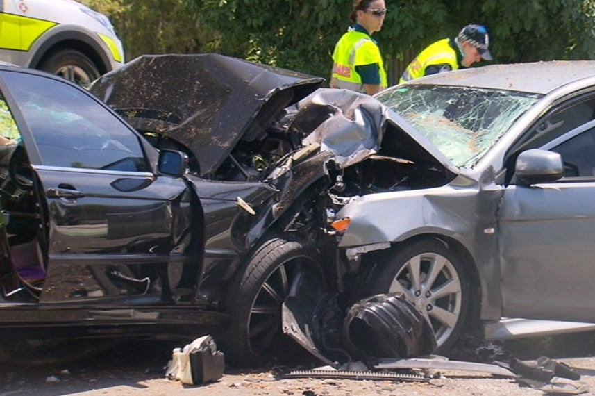 Wreckage of two cars in a fatal crash at Manly West that killed a mother and daughter.
