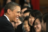 Barack Obama greets students