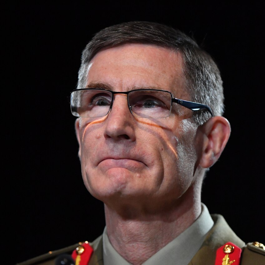 General Angus Campbell wearing glasses and uniform looking left of camera