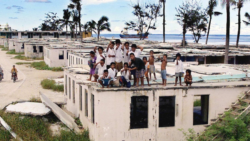 Children play in a residential area on the island nation of Nauru.