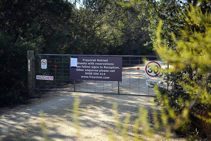 A gate closed at the entrance to Freycinet Resort