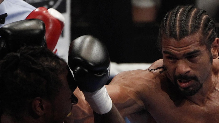 David Haye (right) lands a punch on Audley Harrison during at the MEN Arena