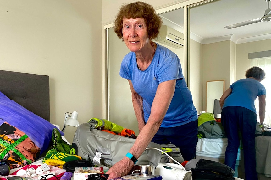 Retiree Gwen Davis-Goff packs her bags ahead of a trip overseas.