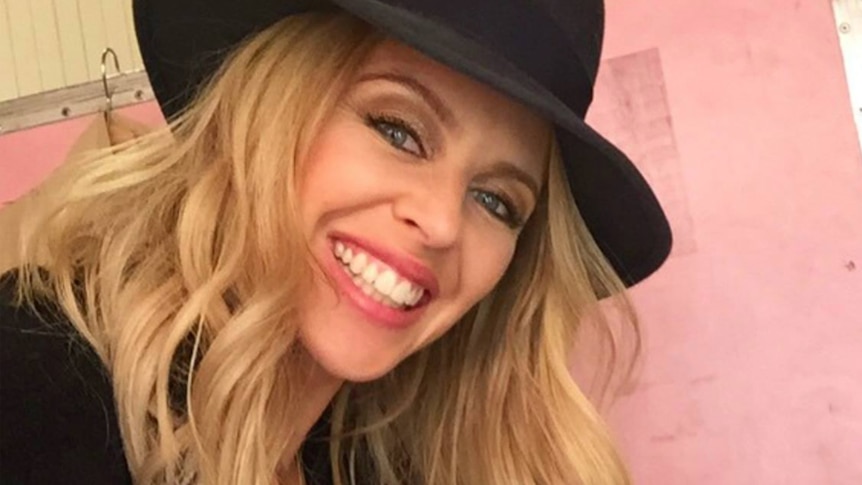 Australian singer Kylie Minogue takes a selfie.